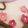 Pakketproduct: aantal bloemetjes licht en donker roze culpitt bij cake, bake & love 3